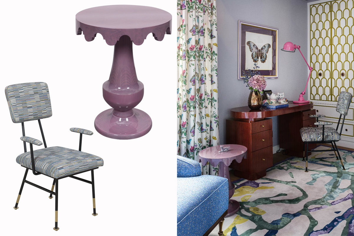 Bedroom interior with a purple side table, grey upholstered chair, and a brown wooden desk.