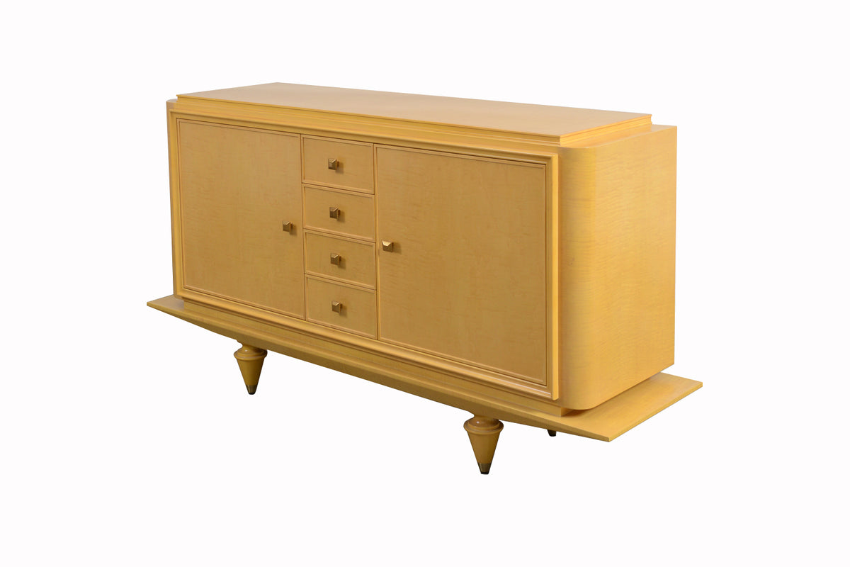 Light brown sideboard with drawers and doors on a white background
